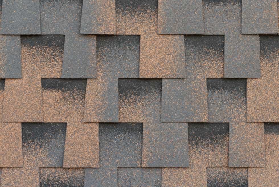 Multiple shingle layers on a roof illustrating correct installation technique