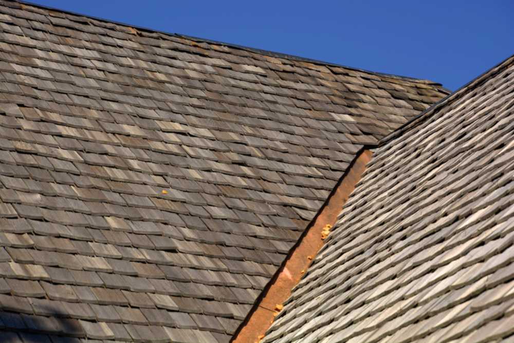 Weathered wood shingles on a roof top of an old hut in Portland, OR